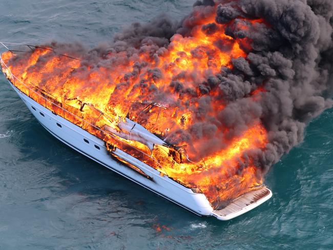 Two people had a lucky escape from a boat fire off Cottesloe Beach in Perth. Picture: Surf Life Saving WA