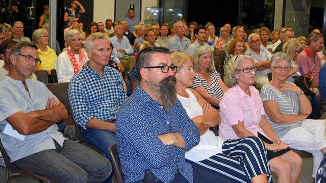 A man unhappy with Airbnb style accommodation in Noosa is Noosa River Village Resort manager Michael Garnham  (front) a row away from Deputy Mayor Frank Wilkie at the lively meeting. Picture: Peter Gardiner