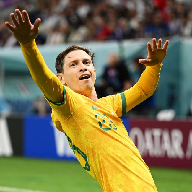 Craig Goodwin celebrates Australia’s opener.