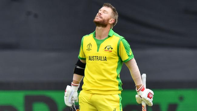 Australia's David Warner celebrates scoring his first century since the ball-tampering ban. Picture: AFP