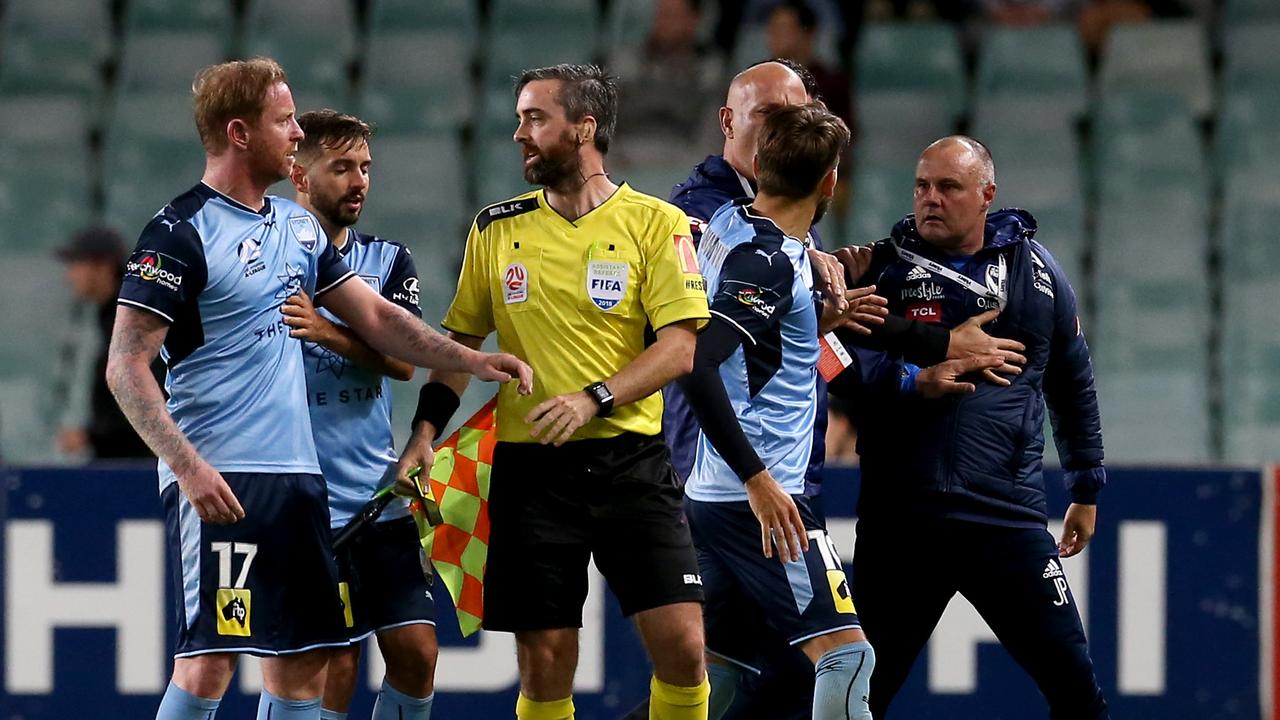 Members of the Melbourne Victory coaching staff after the confrontation with David Carney.