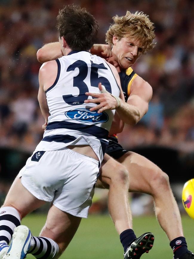 Patrick Dangerfield and Rory Sloane clash in the second quarter.