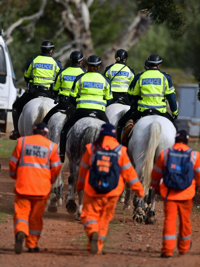 Police and SES members set off on a search of Oulnina Park Station. Picture: Tom Huntley