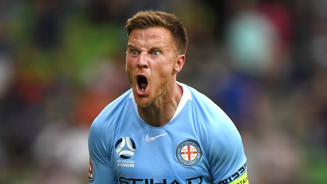 Former Adelaide United left back Scott Jamieson is now captain of Melbourne City, he reacts against Perth Glory in Melbourne in March. (AAP Image/Julian Smith)
