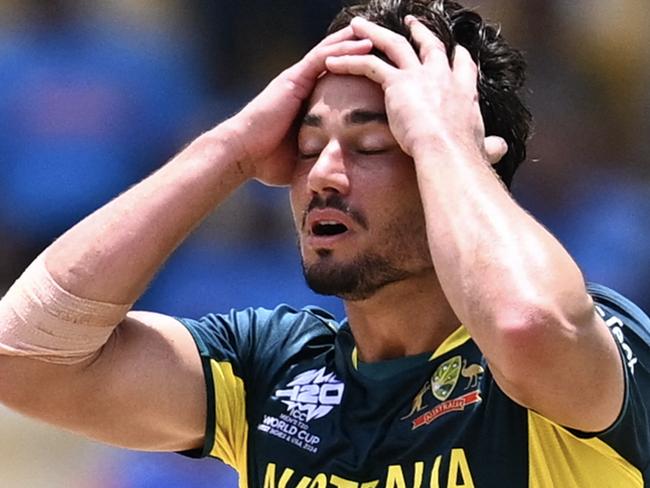 Australia's Marcus Stoinis reacts after dismissing India's Shivam Dube during the ICC men's Twenty20 World Cup 2024 Super Eight cricket match between Australia and India at Daren Sammy National Cricket Stadium in Gros Islet, Saint Lucia on June 24, 2024. (Photo by Chandan Khanna / AFP)