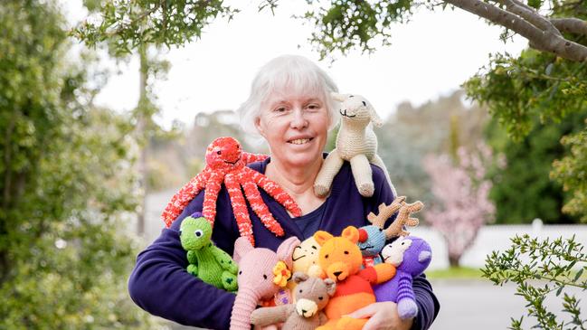 Toys galore: Knit One Give One volunteer Joy Bourne knits toys for the underprivileged, including Christmas appeals. Picture: Chloe Smith