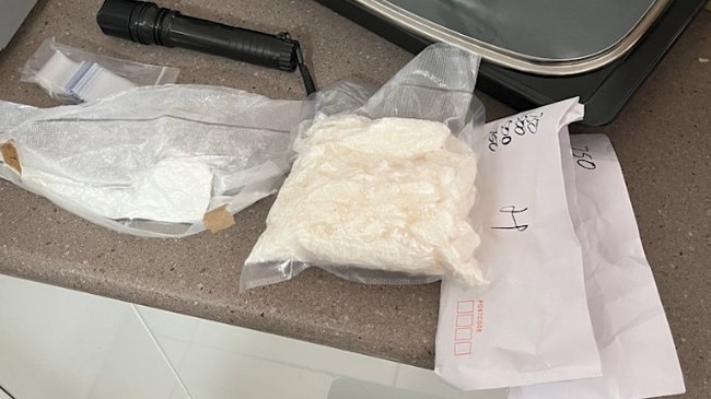 Police allegedly seized drugs, cash, and weapons in the raids at Surfers Paradise and Biggera Waters. Picture: QPS