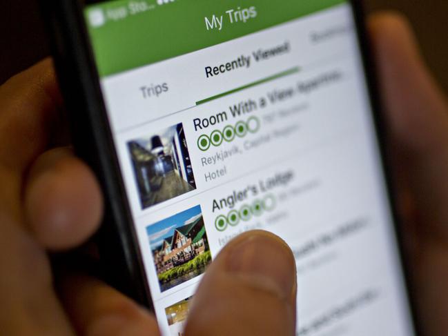 The TripAdvisor Inc. application is demonstrated on an Apple Inc. iPhone for a photograph in Washington, D.C., U.S., on Friday, May 5, 2017. TripAdvisor is scheduled to released earnings figures on May 9. Photographer: Andrew Harrer/Bloomberg via Getty Images