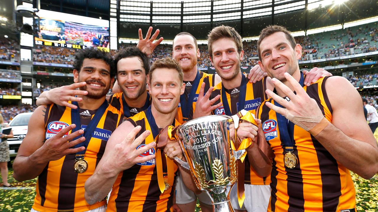 Four-time premiership player Jordan Lewis (second left) has announced his retirement. Photo: Colleen Petch.