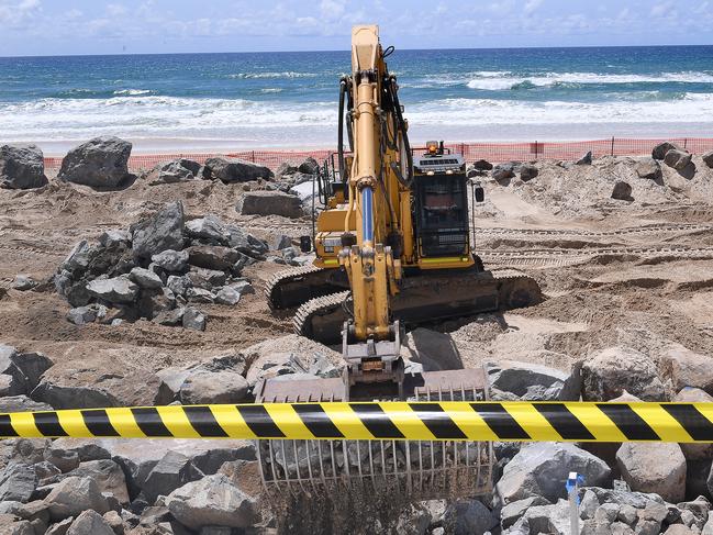 Seawall construction is seen on the Gold Coast, Wednesday, February 20, 2019. Huge swells and high tides are set to pummel south-east Queensland beaches over the coming days as Cyclone Oma tracks towards the Queensland coast. (AAP Image/Dave Hunt) NO ARCHIVING