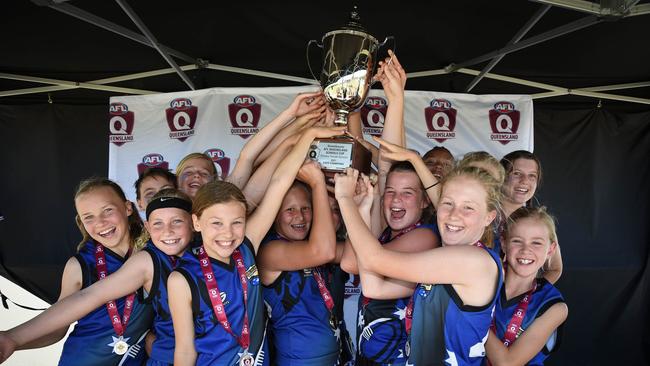 Mooloolaba State School celebrate after winning the primary female division at the AFLQ Schools cup. Picture: High Flyer Images