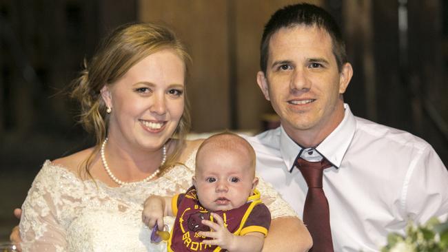 Go Broncos: Dion Ward &amp; Ashleigh Thiele with baby daughter Chole Hannah cheering for the team! pic: Ben Clark Photography