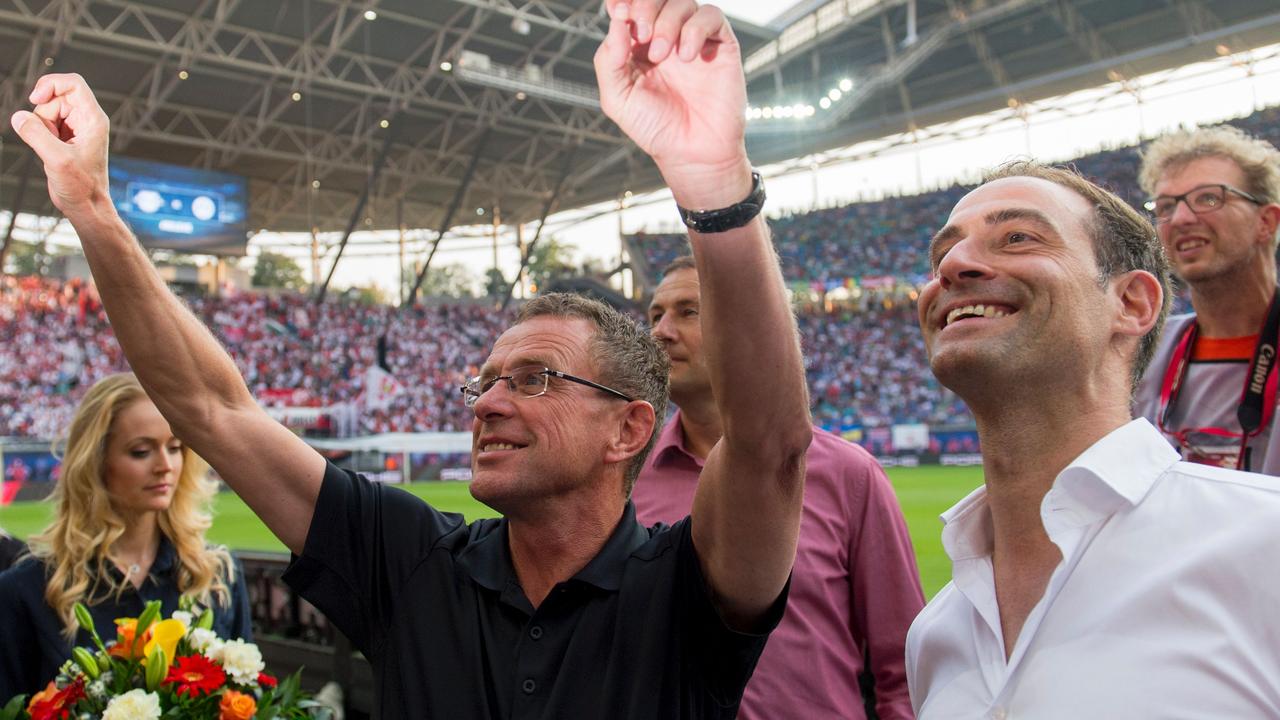 The head of RB Leipzig Oliver Mintzlaff (R) and Manager Ralf Rangnick in 2016. AFP PHOTO / ROBERT MICHAEL