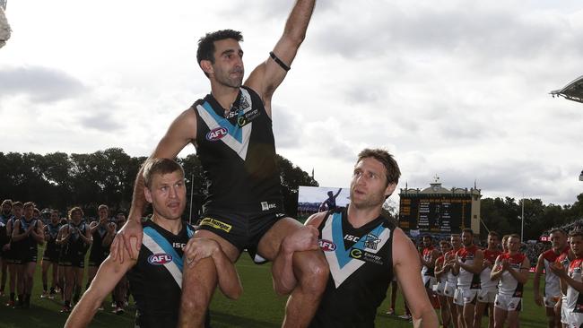 Dom Cassisi is chaired from the ground in his final game for Port Adelaide. Picture: Sarah Reed