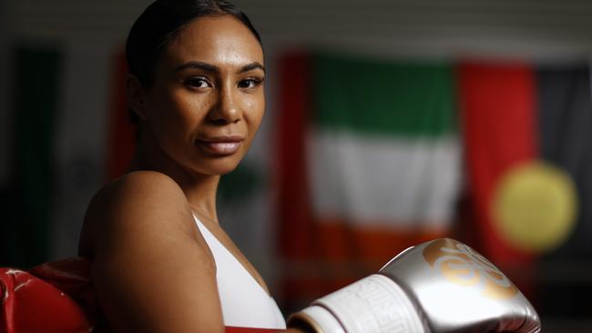 WEEKEND TELEGRAPHS SPECIAL MAY 20, 2022. PLEASE CONTACT WEEKEND PIC EDITOR BEFORE PUBLISHING. Shanell Dargan went viral with her Australian X Factor audition. But the talented singer has swapped the microphone for gloves and wants to be the first Indigenous Australian female boxing world champion. Pictured in the ring at the PCYC in Minto. Picture: Jonathan Ng