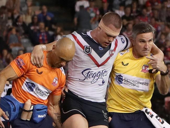 NEWCASTLE, AUSTRALIA - MAY 01: Lindsay Collins of the Roosters is taken off Injured during the round eight NRL match between the Newcastle Knights and the Sydney Roosters at McDonald Jones Stadium, on May 01, 2021, in Newcastle, Australia. (Photo by Ashley Feder/Getty Images)