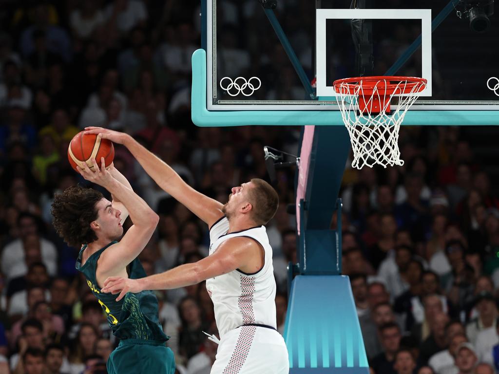 Nikola Jokic blocks the shot of Josh Giddey late in overtime. (Photo by Jamie Squire/Getty Images)