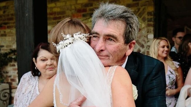 Paul Brock (pictured with daughter Erin Robertson and wife Diane Brock) died in a horrific car crash in Lucas Heights in January 2019.