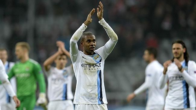 Manchester City's Brazilian midfielder Fernandinho applauds the fans. 