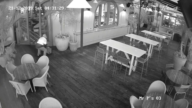 CCTV footage shows suspect in fire at Howard Smith Wharf bar.