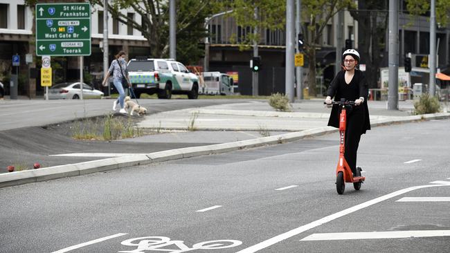 An e-scooter rider on a bike lane in Melbourne. Picture: NCA NewsWire / Andrew Henshaw