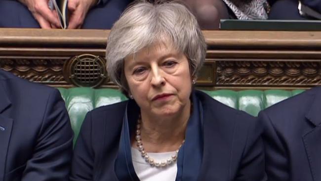 Theresa May listens to the result of the Brexit withdrawal vote. Picture: AFP. 