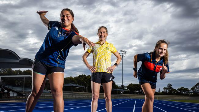 Champion SA and Australia runner Jess Stenson with discus athlete Marley Raikiwasa (left) and runner Tessa Ebert. Picture: Tom Huntley