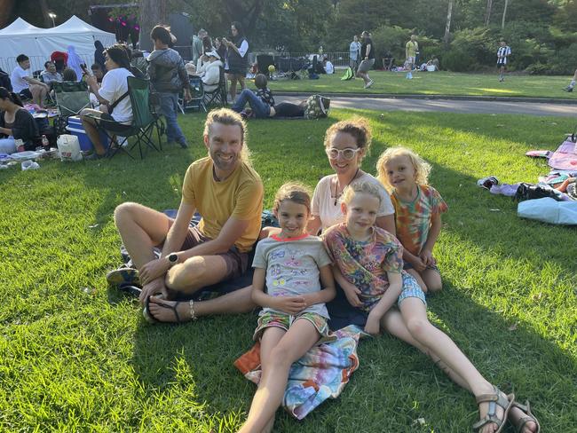 Sally and David France and kids at Treasury Gardens in the Melbourne CBD for the 2024 New Year's Eve fireworks. Picture: Gemma Scerri