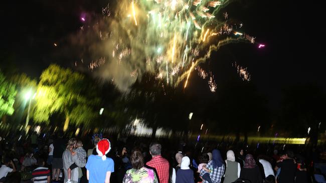 The early New Year’s Eve fireworks at Yarra Park. Picture: Stuart Milligan.