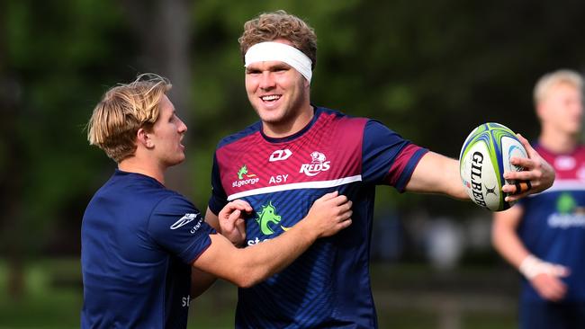 Tate McDermott and fellow Reds young gun Angus Scott-Young at training in Brisbane, Monday, April 29. Picture: AAP Image/Dan Peled