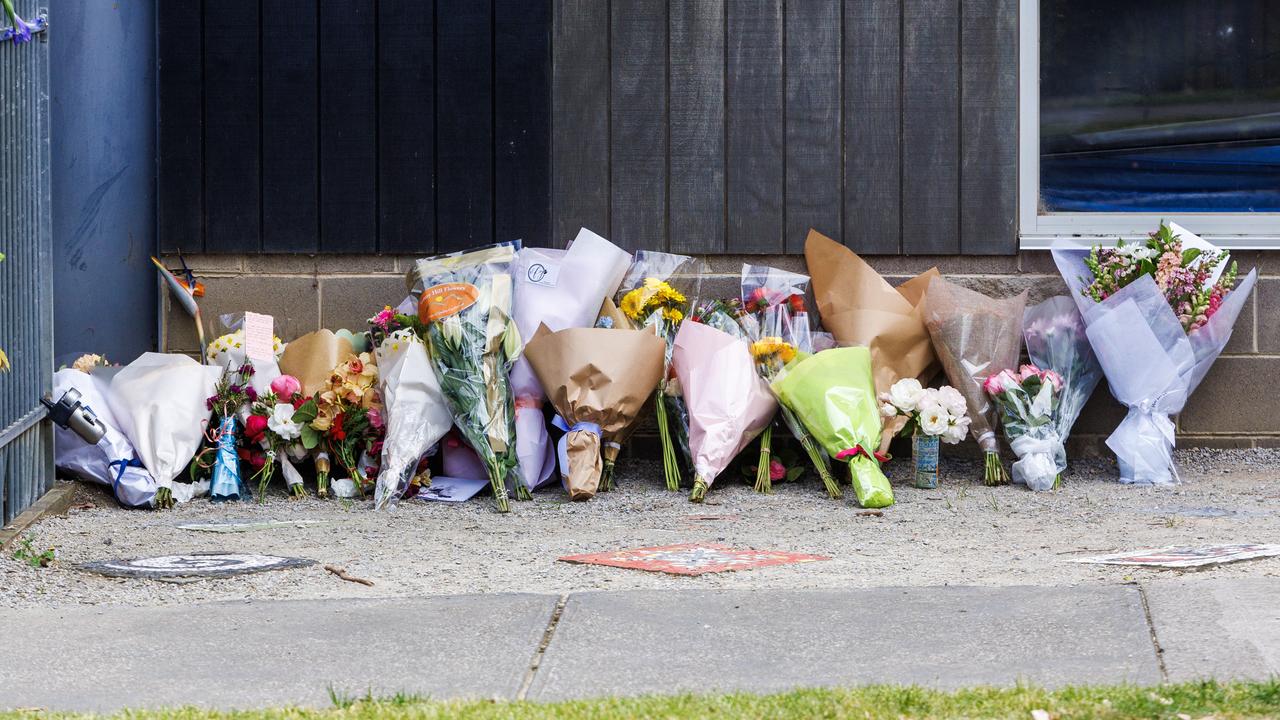 Floral tributes were placed outside Auburn South Primary School on Wednesday. Picture: NewsWire / Aaron Francis