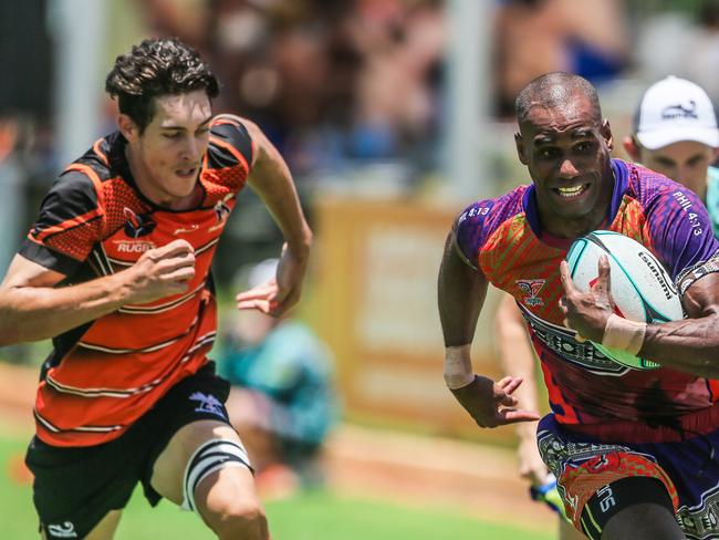 Emori Aqua (Ball) id chased down by NT's Jordan Waterbury as Legends Tabadamu V NT Mozzies during the midday sessions of the Hottest 7's Rugby Union .Picture GLENN CAMPBELL