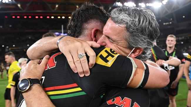 Nathan and Ivan Cleary embrace on the field after the Panthers’ NRL grand final win. Picture: Bradley Kanaris / Getty Images