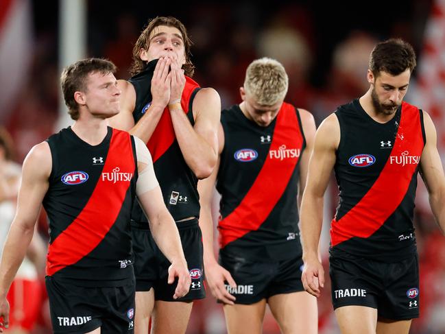 MELBOURNE, AUSTRALIA - AUG 16: Harrison Jones of the Bombers looks dejected after a loss during the 2024 AFL Round 23 match between Essendon Bombers and the Sydney Swans at Marvel Stadium on August 16, 2024 in Melbourne, Australia. (Photo by Dylan Burns/AFL Photos via Getty Images)