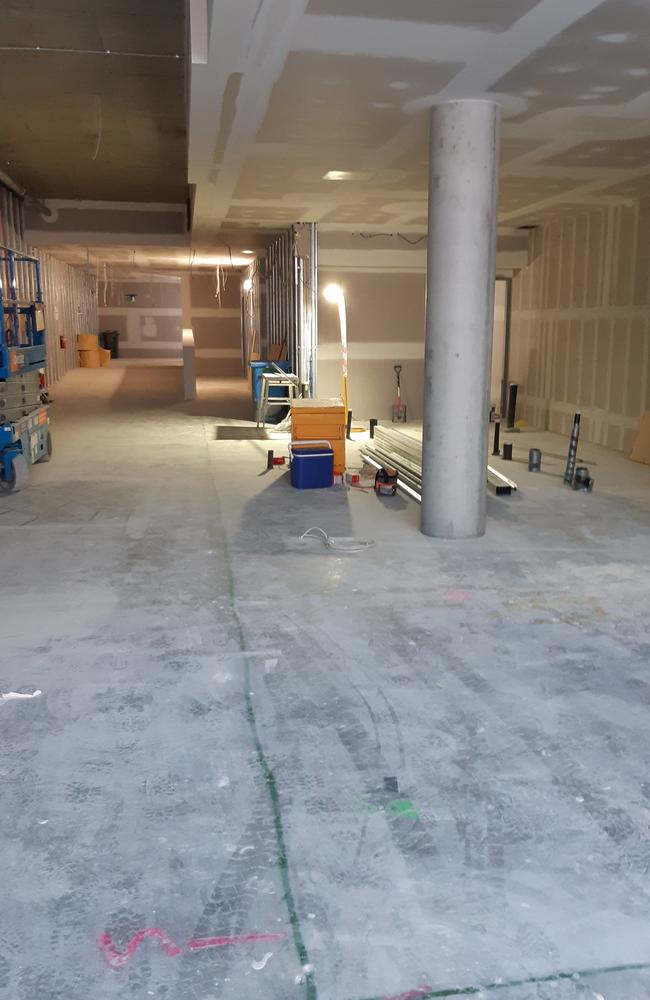 Photos inside the cinema entrance and candy bar under construction in Wynnum.