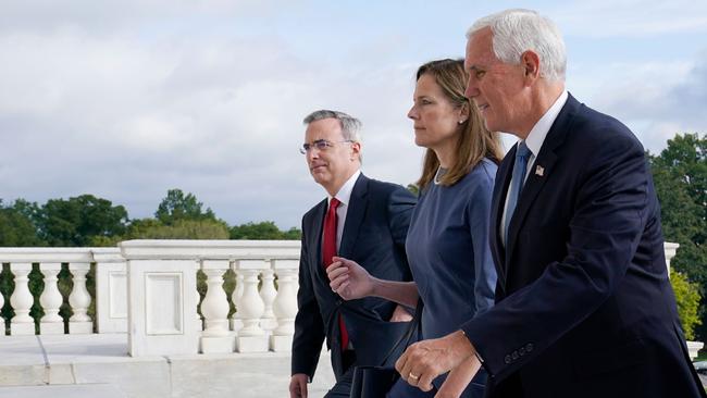 Then-White House Counsel Pat Cipollone walks up the steps of Capitol Hill with Supreme Court nominee Judge Amy Coney Barrett and then-Vice President Mike Pence. Picture: AFP