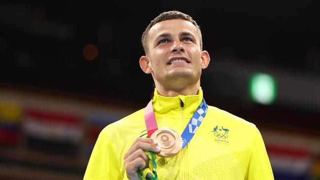 Harry Garside of Team Australia celebrates with his bronze medal during the victory ceremony for the Men's Light (57-63kg) Final on day sixteen of the Tokyo 2020 Olympic games at Kokugikan Arena on August 08, 2021 in Tokyo, Japan. (Photo by Buda Mendes/Getty Images)