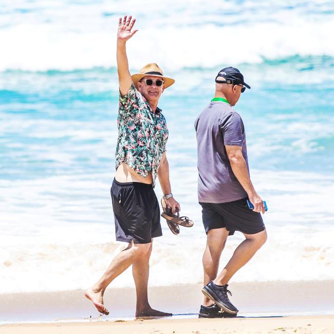 Tom Hanks enjoying a stroll along the beach in Broadbeach on the Gold Coast in January. Picture: Nigel Hallett