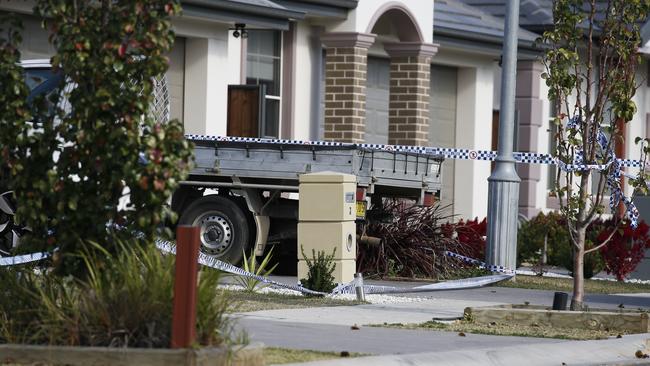 The scene of the house fire. Police have identified and analysed the getaway vehicle used by the home intruders.