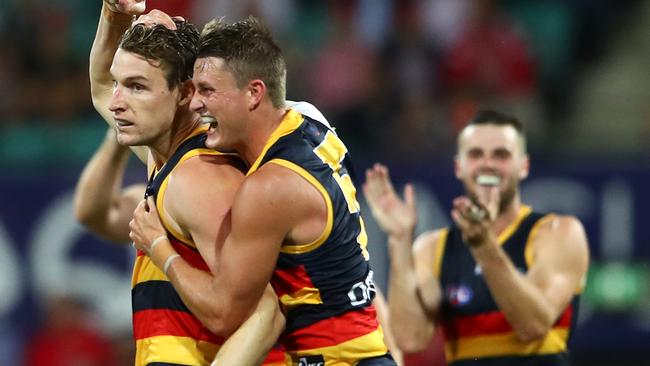 SYDNEY, AUSTRALIA — MARCH 29: Josh Jenkins of the Crows celebrates kicking a goal during the round two AFL match between the Sydney Swans and the Adelaide Crows at Sydney Cricket Ground on March 29, 2019 in Sydney, Australia. (Photo by Cameron Spencer/AFL Media/Getty Images)