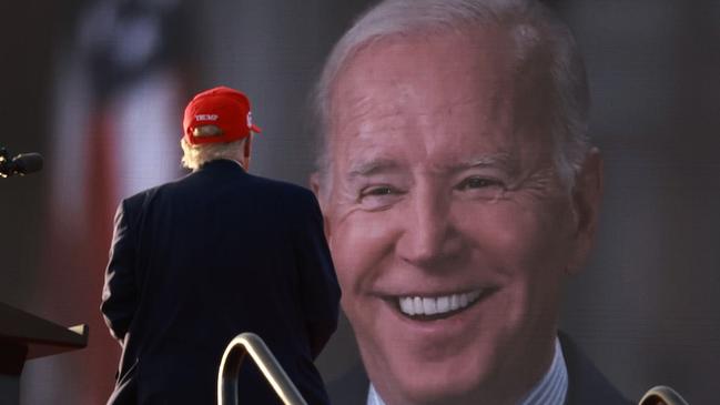 Donald Trump watches a video of President Joe Biden. The pair will meet again on Friday our time for the crucial presidential debate. Picture: Joe Raedle / Getty Images.