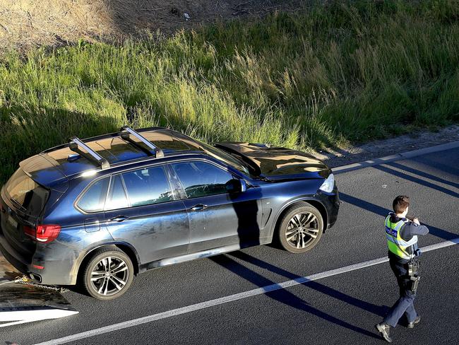 A BMW believed to have been used in a hit-run in Mitcham is loaded onto a trailer. Picture: Mark Stewart