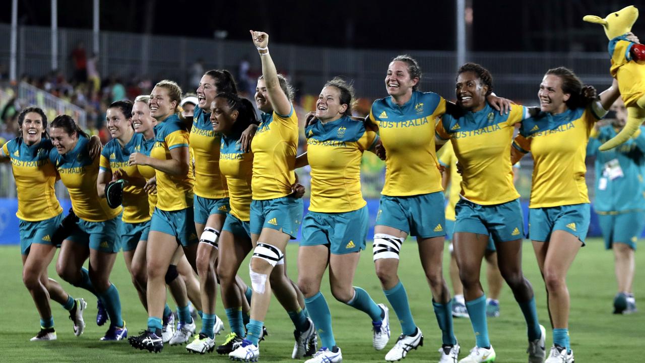 Australia’s women’s rugby sevens team celebrates winning gold at Rio with victory over New Zealand in the final.