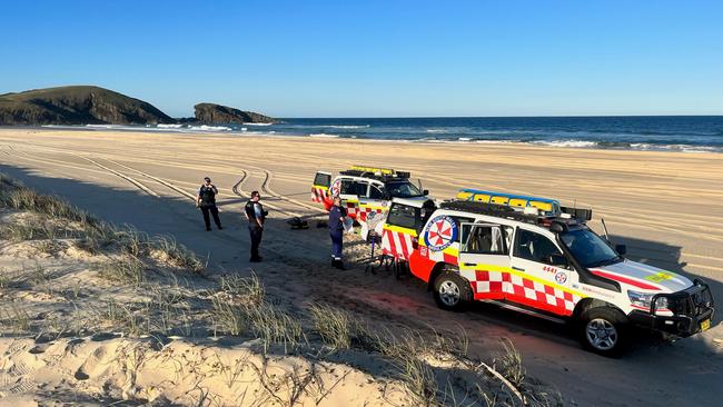 Paramedics were called to Queens Head north of Port Macquarie after the two men were swept overboard and made it to shore with serious injuries.