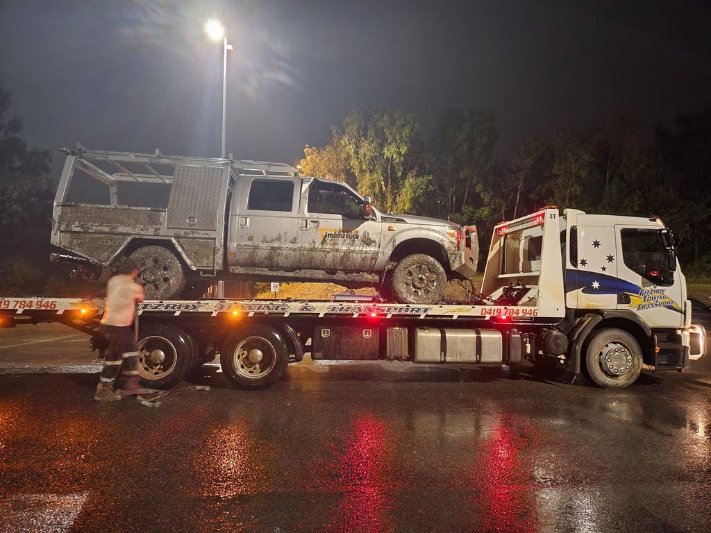 CQ Crane Hire lifting the stolen $350,000 Ford F350 ute over the jetty at the Quay Street boat ramp after it was winched out of the crocodile infested Fitzroy River in an eight-hour salvage operation on July 4, 2023. The ute belonged to Stewart Gander from Benalla, Victoria. It had been stolen from a Yeppoon caravan park just after midnight on July 2, 2023.