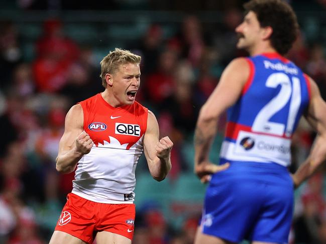 SYDNEY, AUSTRALIA - JULY 08: IsaacÃÂ Heeney of the Swans celebrates kicking a goal during the round 17 AFL match between the Sydney Swans and the Western Bulldogs at Sydney Cricket Ground on July 08, 2022 in Sydney, Australia. (Photo by Cameron Spencer/Getty Images)