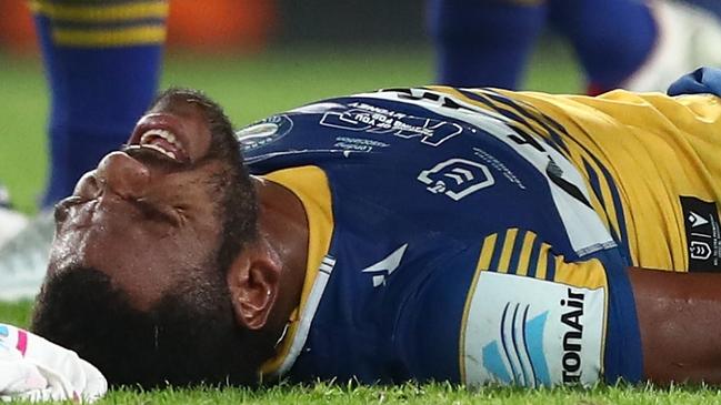 GOLD COAST, AUSTRALIA - AUGUST 21: Maika Sivo of the Eels receives attention on the field during the round 23 NRL match between the Parramatta Eels and the North Queensland Cowboys at Cbus Super Stadium, on August 21, 2021, in Gold Coast, Australia. (Photo by Chris Hyde/Getty Images)