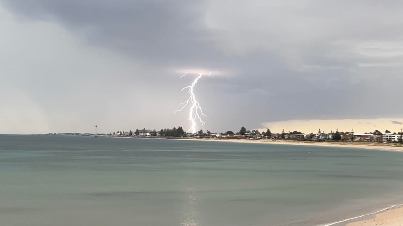 Lightning seen over Brighton . Picture: Leighton Cassebohm