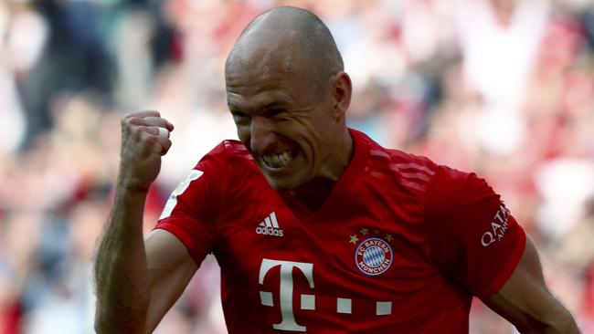 Bayern's Arjen Robben celebrates after scoring his side's fifth goal during the German Bundesliga matchagainst Eintracht Frankfurt in Munich. Picture: Matthias Schrader