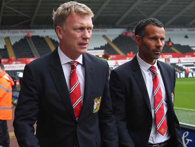 David Moyes with Ryan Giggs, shortly before the end of his Manchester United reign. Picture: Michael Steele/Getty Images